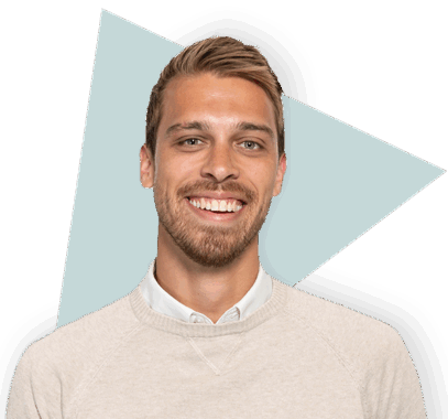 Creative professional smiling, modern office background, Keylane Careers, diverse team, career growth, software development, insurance technology, innovative work environment, job opportunities, IT careers.