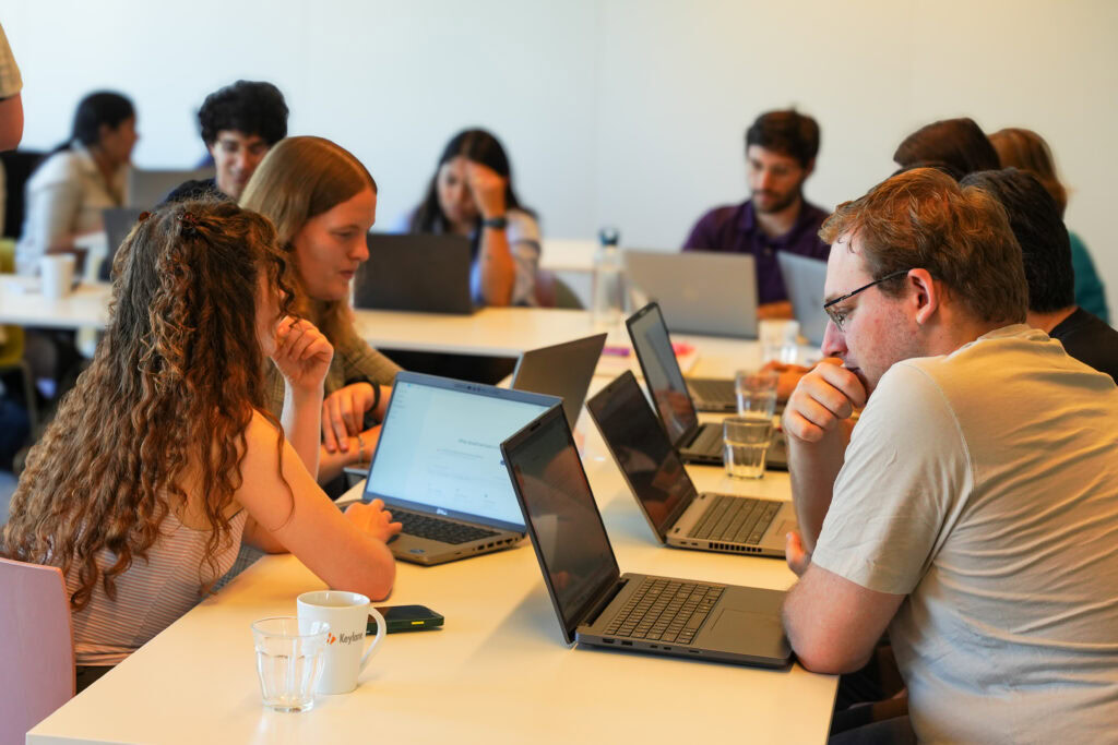 Colleagues designing AI solutions during a hackaton.