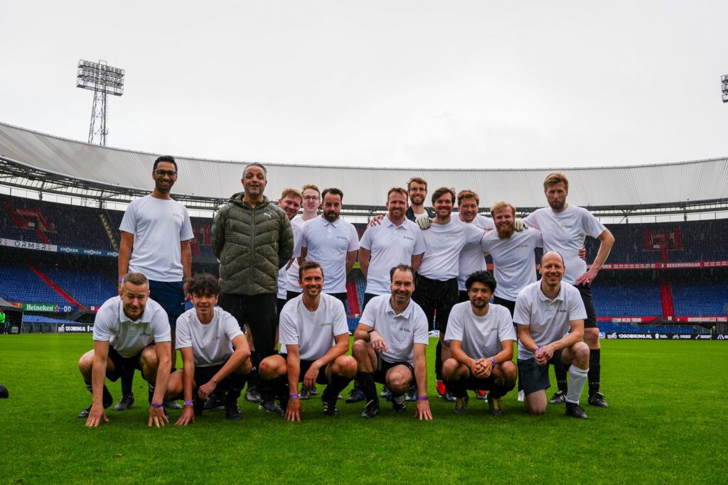 The Keylane team of sixteen colleagues on the pitch at De Kuip after the corporate football tournament